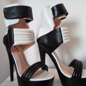 Size 7 unworn high heel platforms